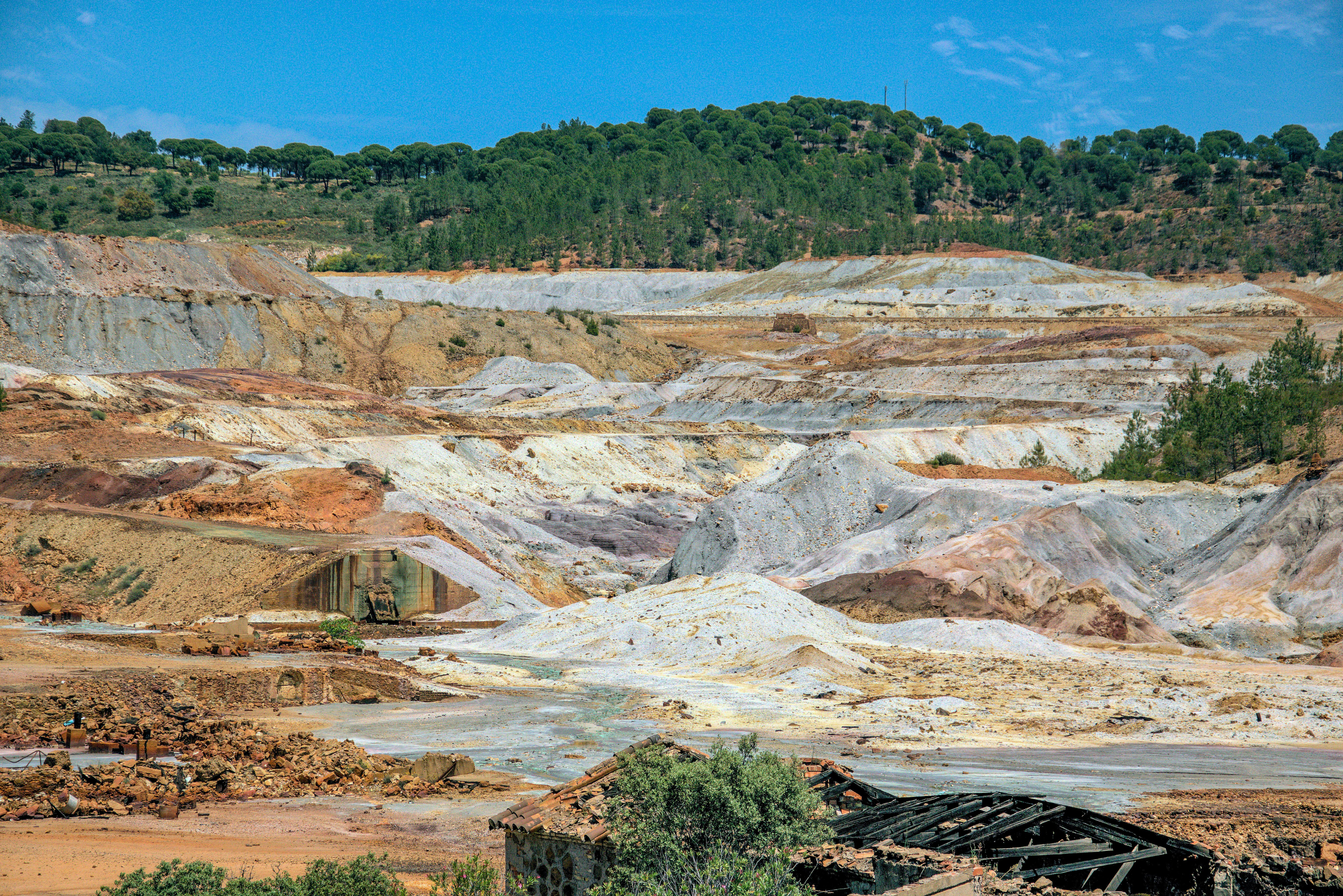 Open-pit mine landscape representing African mining execution and asset value recovery