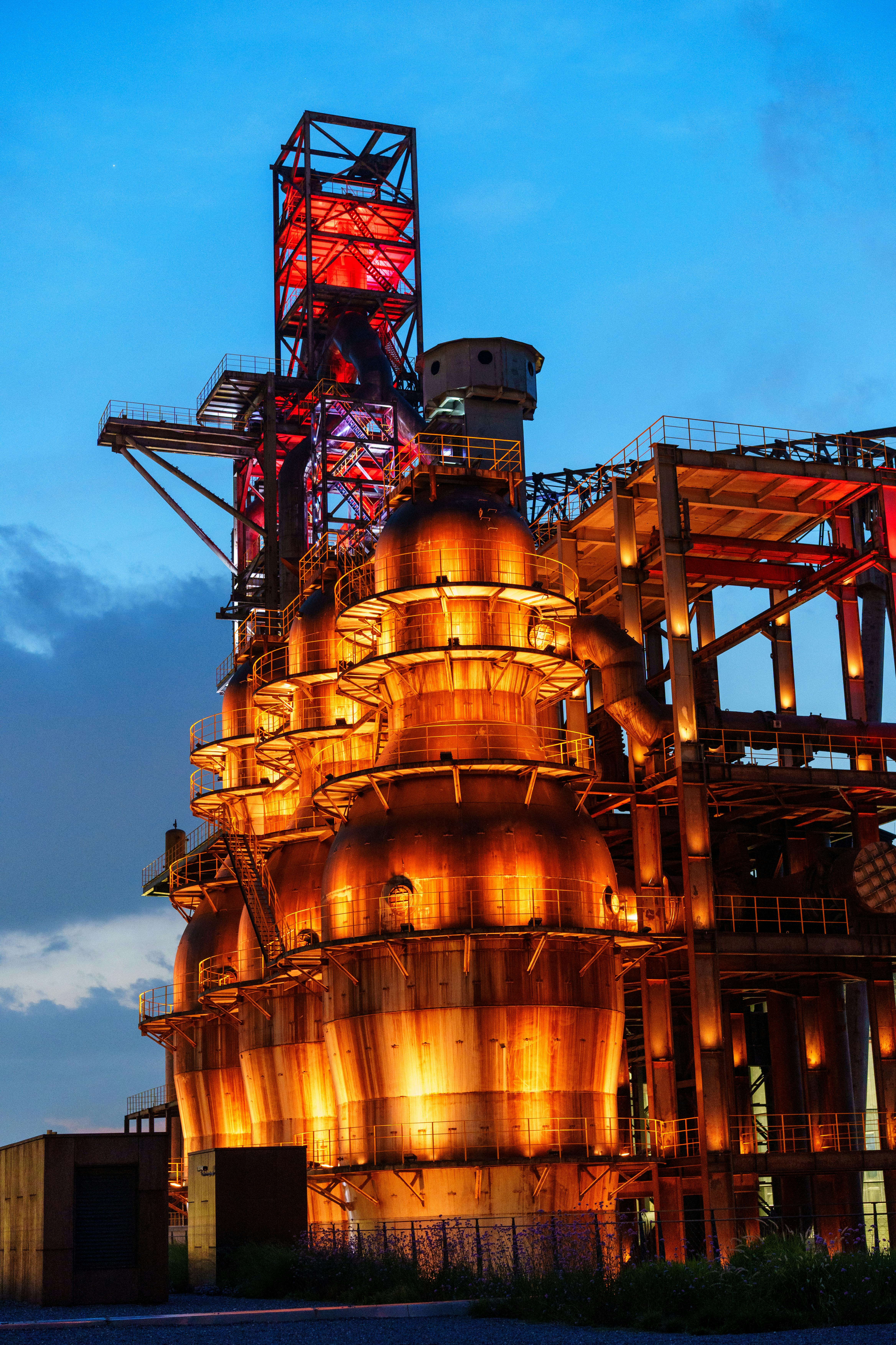 Illuminated processing tower used to represent executive briefings for asset-intensive leaders